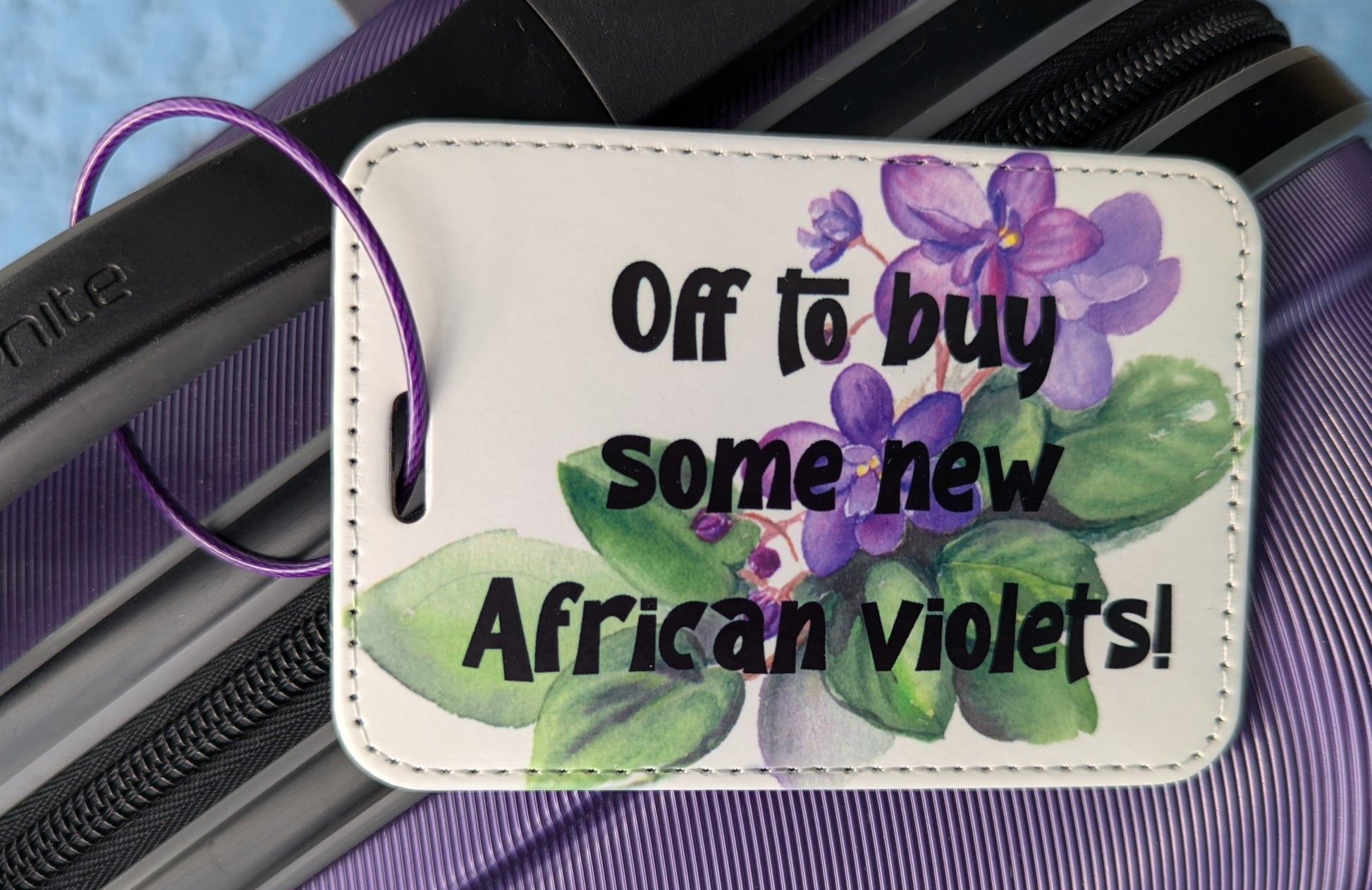 Luggage Tag Off to buy some new African violets!